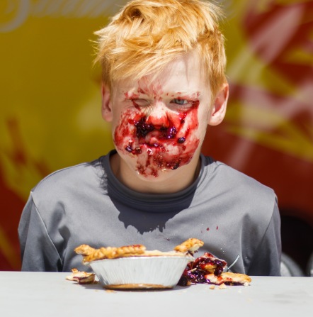 Chelsea Kemp/OWW Luke Wonderham, ten-years-old, eats his way to victory at the Bragg Creek Days annual pie eating contest on Saturday, July 21, 2018. The community celebration featured a parade, pancake breakfast, pie eating contest and poker run over the weekend.